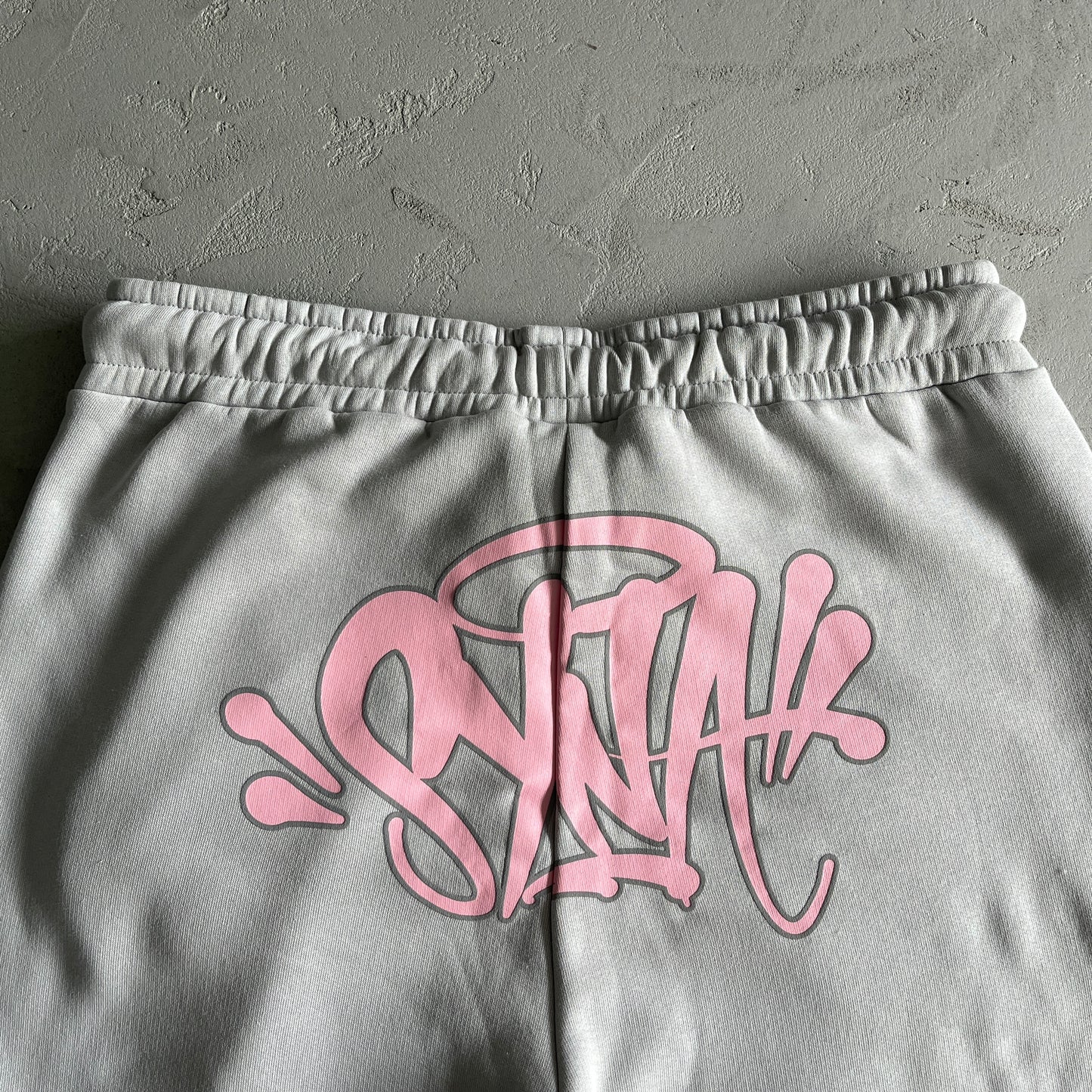 SYNAWORLD “SYNA LOGO” TRACKSUIT – GREY/PINK